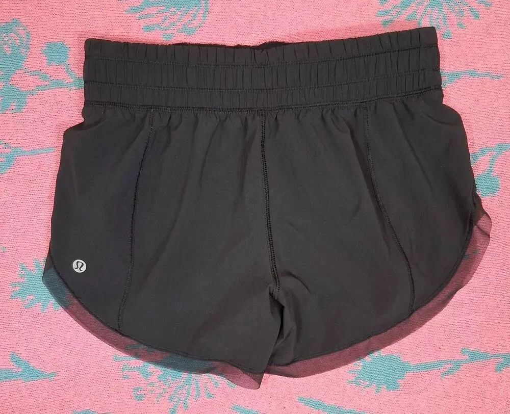 Lululemon womens size 4 mesh hem black running shorts gym Activewear athletic